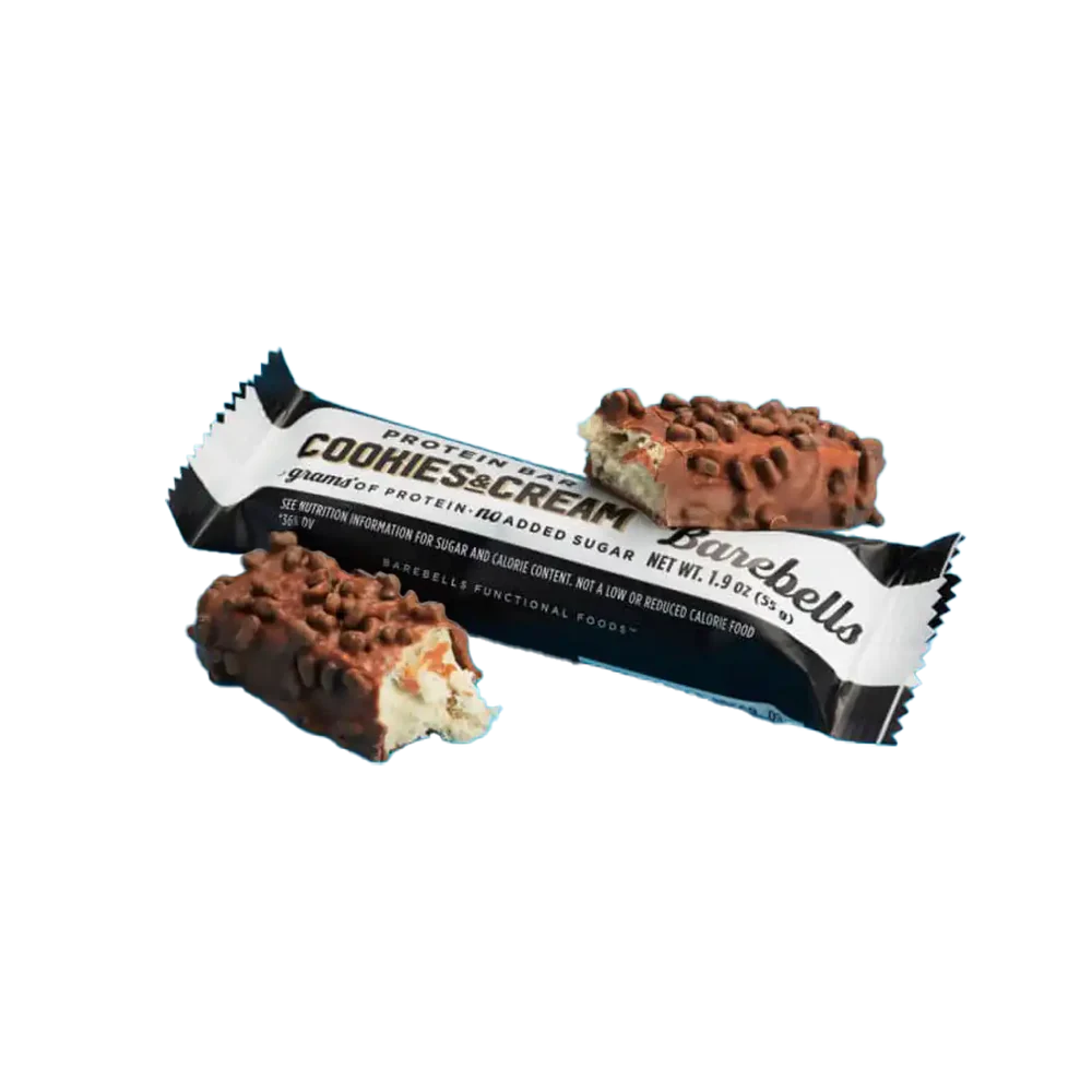 Cookies & Cream Barebells protein bar with packaging on a white background Muscle Mecca