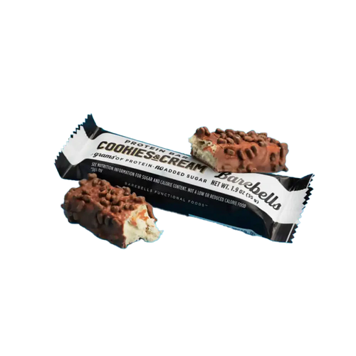 Cookies & Cream Barebells protein bar with packaging on a white background Muscle Mecca