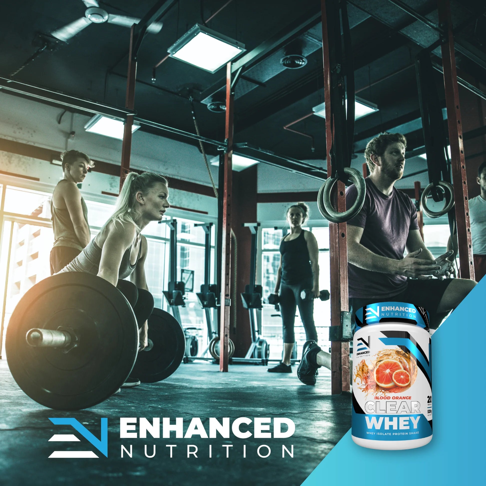 Gym setting with people working out and Enhanced Nutrition whey protein supplement in the foreground.