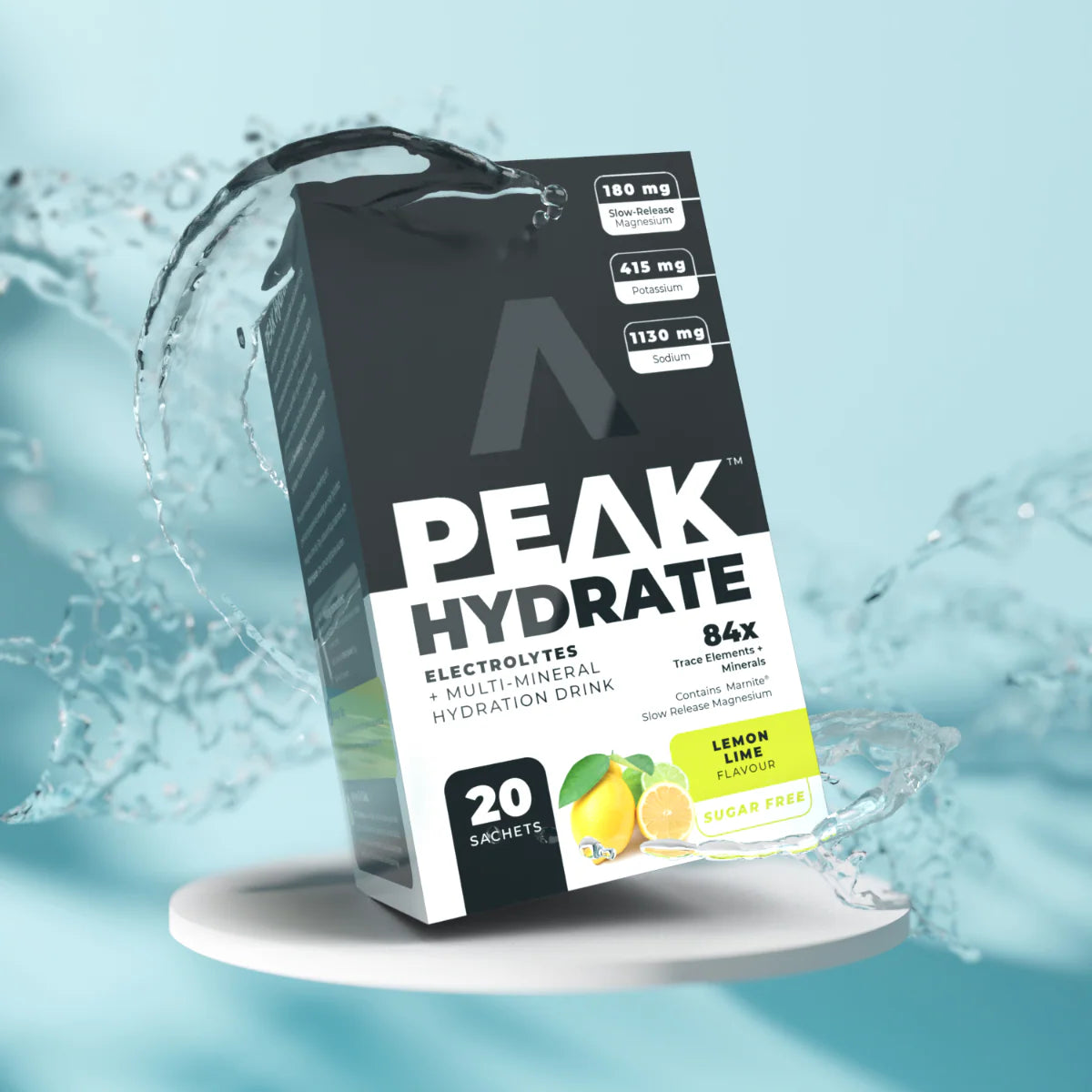 Peak Hydrate electrolytes multi-mineral hydration drink package on a light blue background with water effects. Muscle Mecca