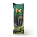 Green package of Muscle Mecca Dubai Chocolate with cityscape design on a white background