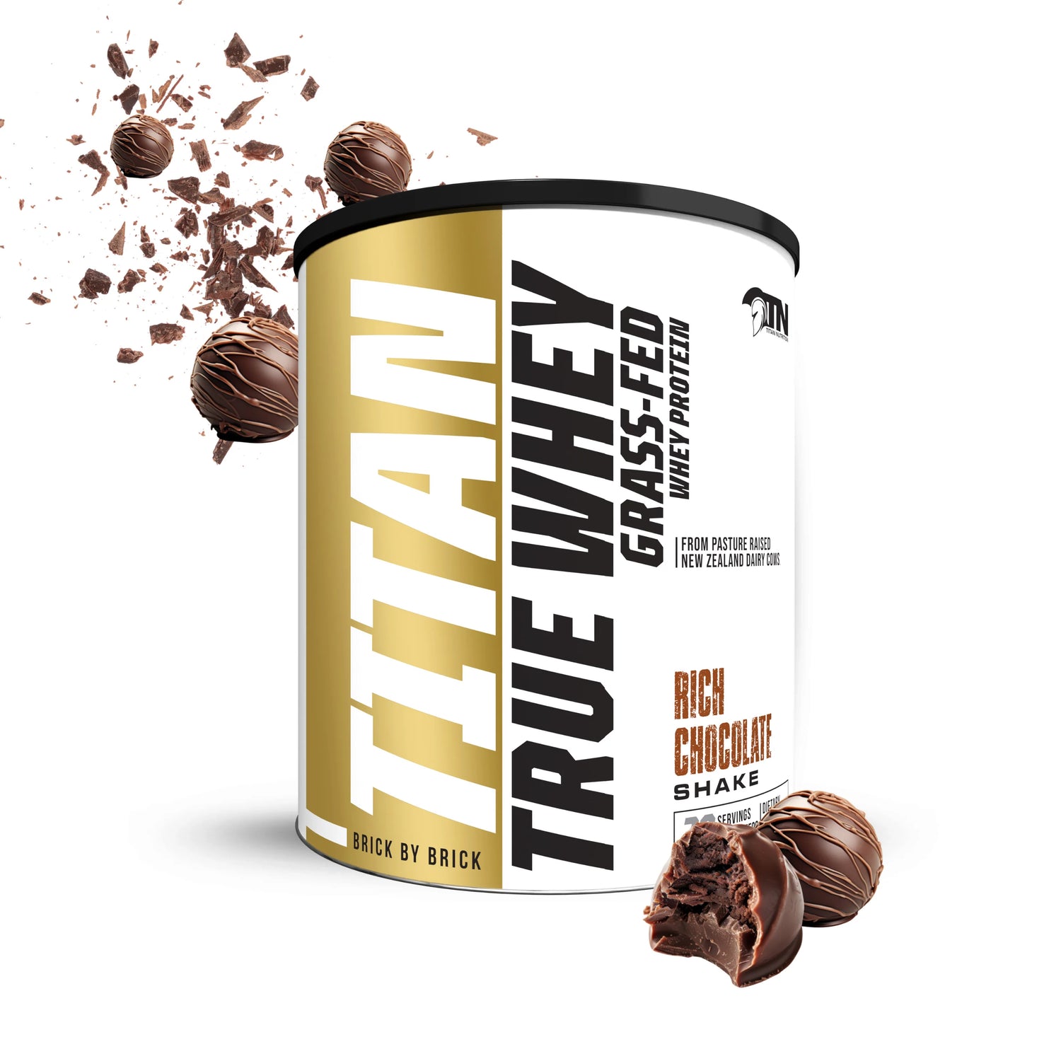 Titan True Whey Grass-Fed protein powder container with chocolate balls on a white background Muscle Mecca