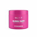 Pink jar of GLOüt Bubble Butt exfoliating body scrub on a white background  Muscle Mecca