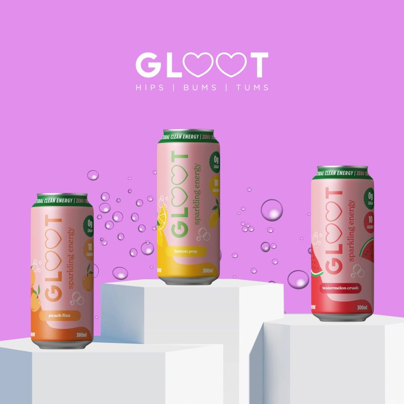 Three GLOOT sparkling energy drink cans in peach, yellow, and strawberry flavors, displayed on white geometric pedestals against a solid purple background with the brand logo above.